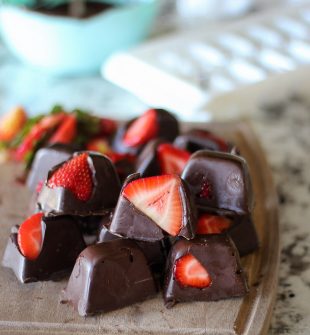 Chocolate Covered Strawberries in an Ice Cube Tray - These cost less than $5 to make! Perfect for entertaining or a night in.