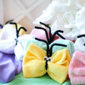 Step by step visual instructions teaching you how to make washcloth butterflies. An adorable and easy craft idea for kids too!