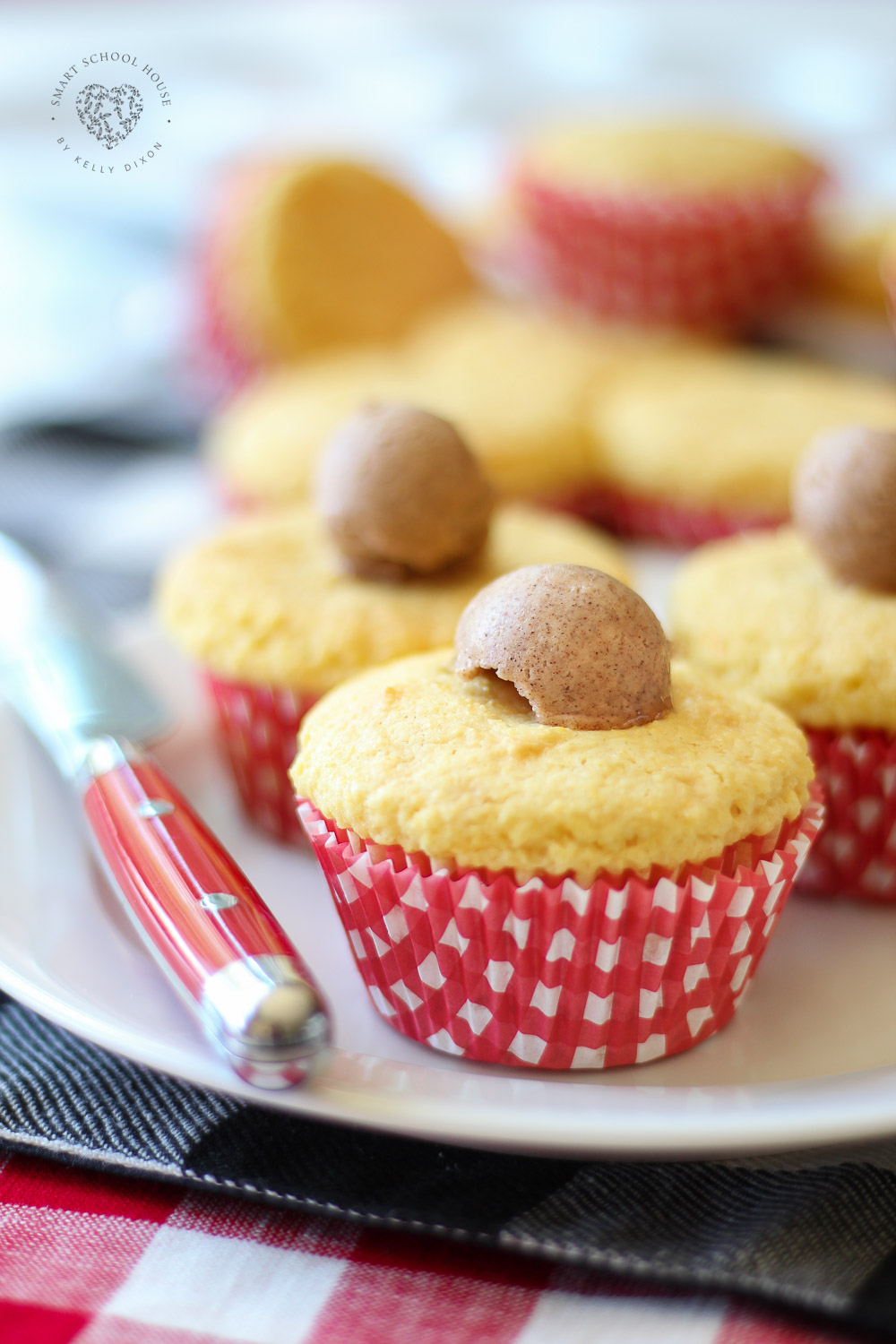 These sweet and fluffy cornbread cupcakes are made with both cake batter and cornbread mix then topped with cinnamon butter. Perfect for a summer for fall BBQ. Even on a cold winter evening, these are the coziest after-dinner treat. They go really well with any crock pot recipe your family loves. #cornbread #cupcakes