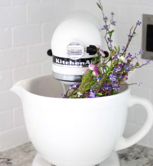Flowers in a Kitchen Aid mixer. A simple and easy way to add color and character and charm to a stand mixer! #kitchendecor #farmhousedecor #farmhousestyle