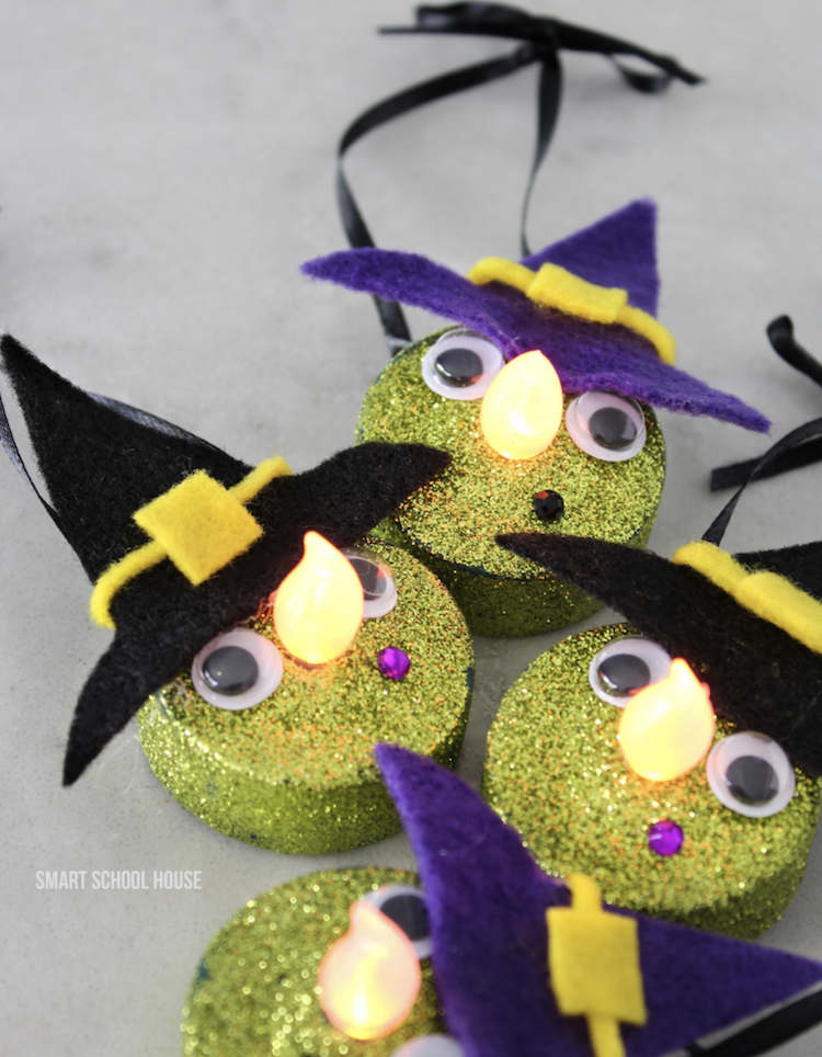 Tea Light Witches are very easy to make and look SO CUTE! Turn on the light and the flame becomes the witch's glowing nose for nighttime Halloween decor.