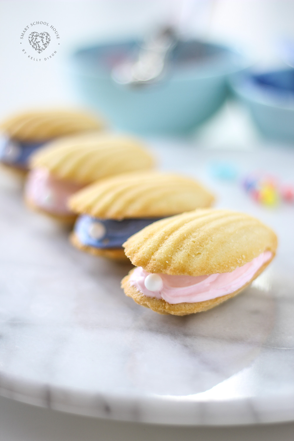 Seashell Pearl Cookies - for a beach theme party or mermaid party. Also fun for a quick and easy dessert using Madeline cookies. #UnderTheSea #MermaidParty #BeachTheme #SeashellCookies