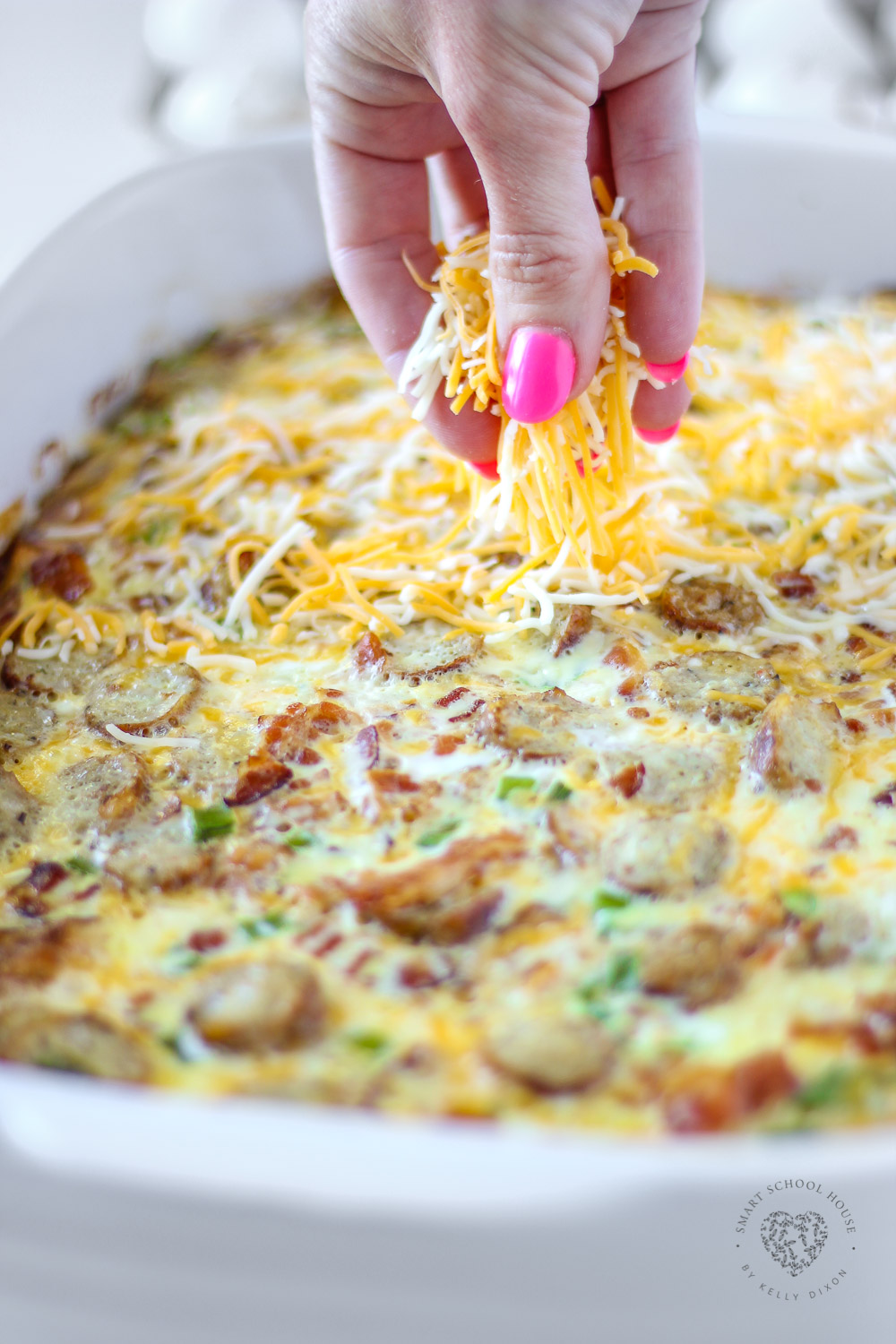 Loaded Hash Brown Breakfast Casserole made with hash brown patties! A wonderful comforting egg casserole loaded with bacon, sausage, and cheese #breakfastcasserole #hasbrowncasserole #hasbrownpattycasserole #breakfastrecipes
