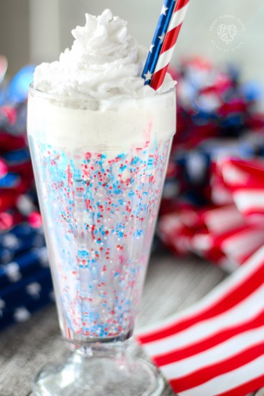 festive vanilla bean milkshake with red white and blue all over for the 4th of July!