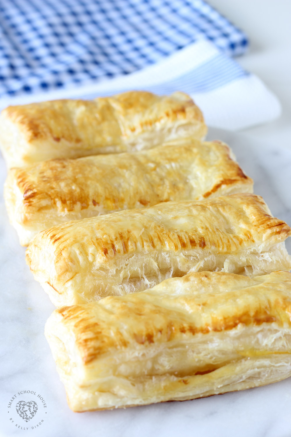 Our Peach Puff Pastry recipe with an irresistible homemade glaze is delicious and so quick & easy to make! It's made using peaches and puff pastry sheets.
