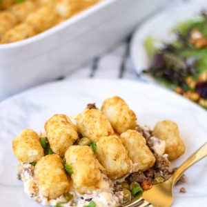 This Cheesy Tater Tot Casserole is the BEST Tater Tot Beef Casserole recipe! Layers of amazing flavor or an easy and delicious dinner any night of the week!