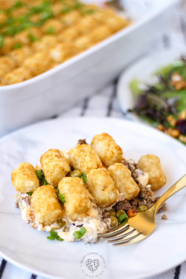 This Cheesy Tater Tot Casserole is the BEST Tater Tot Beef Casserole recipe! Layers of amazing flavor or an easy and delicious dinner any night of the week!
