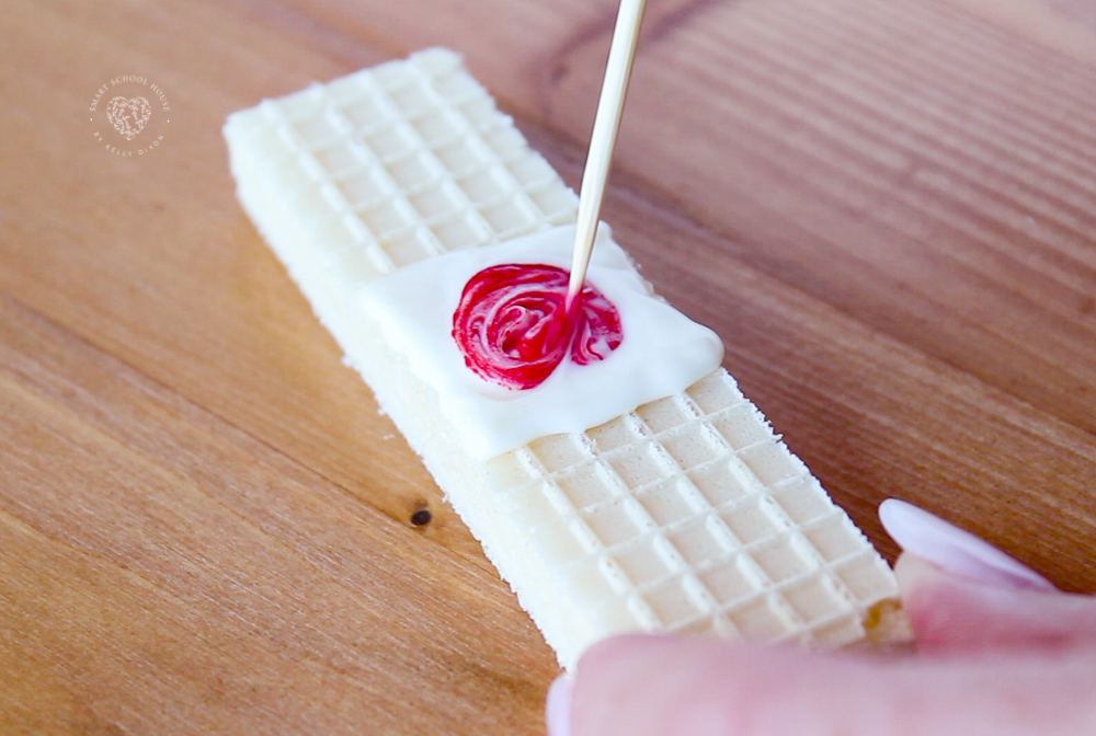How to make a cookie that looks like a band aid using vanilla wafers
