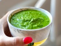 Take traditional chimichurri sauce to new, creamier level. Delicious on grilled veggies, meat, in tacos or burgers, drizzled on empanadas, used as a dip, or even as as a salad dressing. This recipe for a colorful chimichurri sauce doubles as a marinade and an accompaniment to all cuts of beef. The ingredients are surprising, fresh, and this creamy sauce is so easy to make! It requires no cooking and takes just five minutes to throw together, making it a quick (and delicious!) addition to a number of meals.