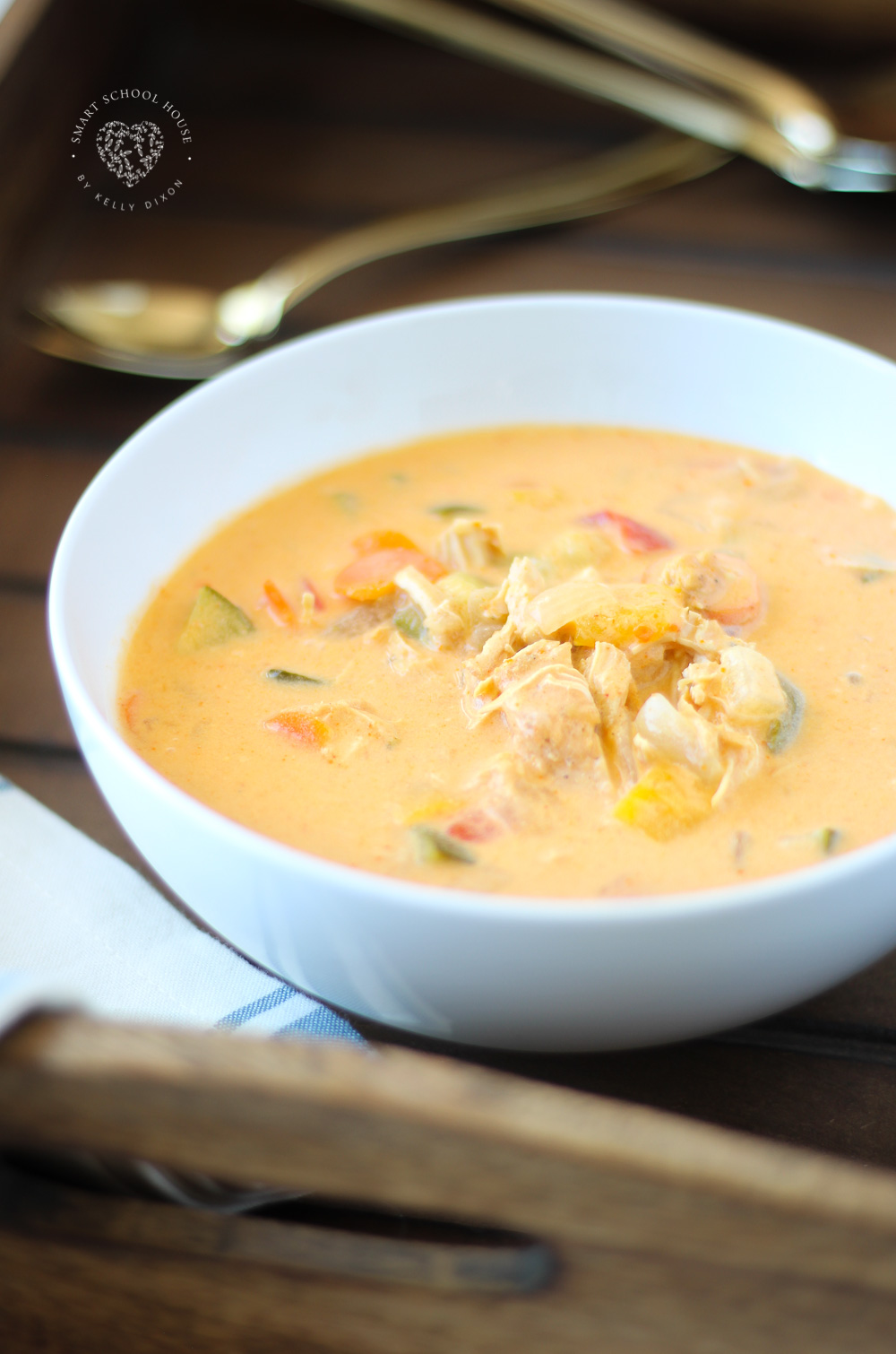 This creamy crock pot curry soup is a healthy dinner recipe that's perfect for fall and winter. Crock pot curry is one of the easiest meals to make and is so tasty. Your family will LOVE it! #chicken #chickencurry #slowcooker #crockpotrecipes #chickenrecipes #thaicurry