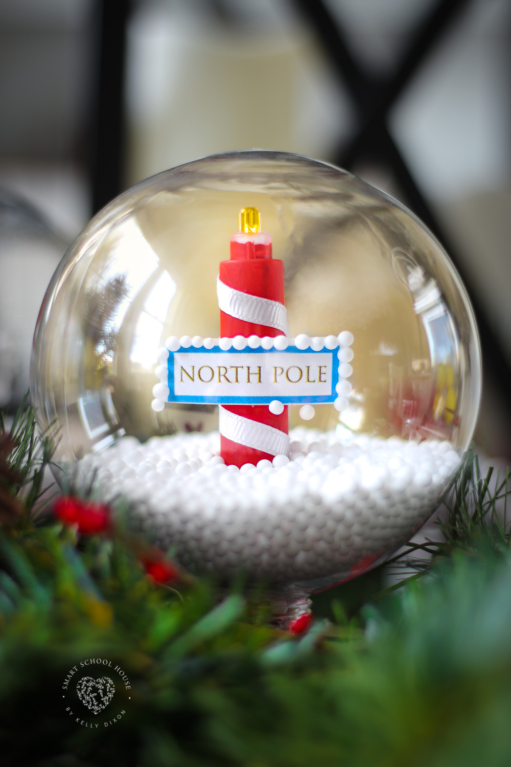 DIY Glowing Solar North Pole Snow Globe Made With a Plastic Ornament for Christmas