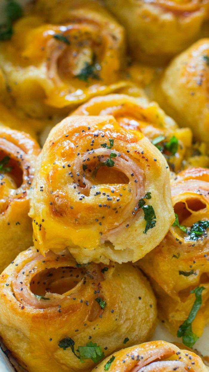 These Hot Turkey and Cheese Party Rolls are an Easy Dinner Recipe or Party Appetizer for Tailgating or Game Day! The perfect bite sized snack for a crowd!