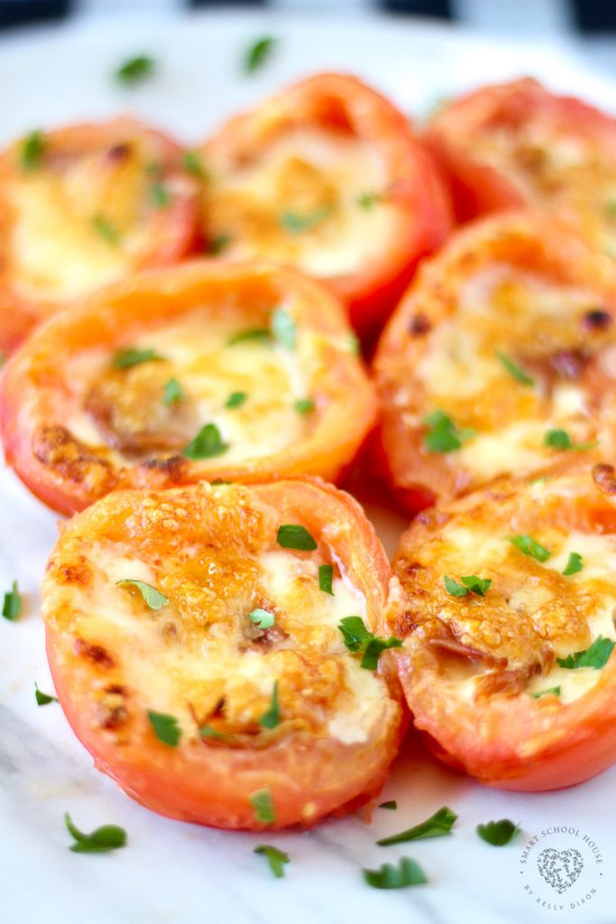 Roma Baked Tomatoes with mozzarella and Parmesan cheese. Topped with prosciutto and broiled to perfection in ten minutes or less.