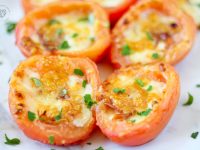 Roma Baked Tomatoes with mozzarella and Parmesan cheese. Topped with prosciutto and broiled to perfection in ten minutes or less.