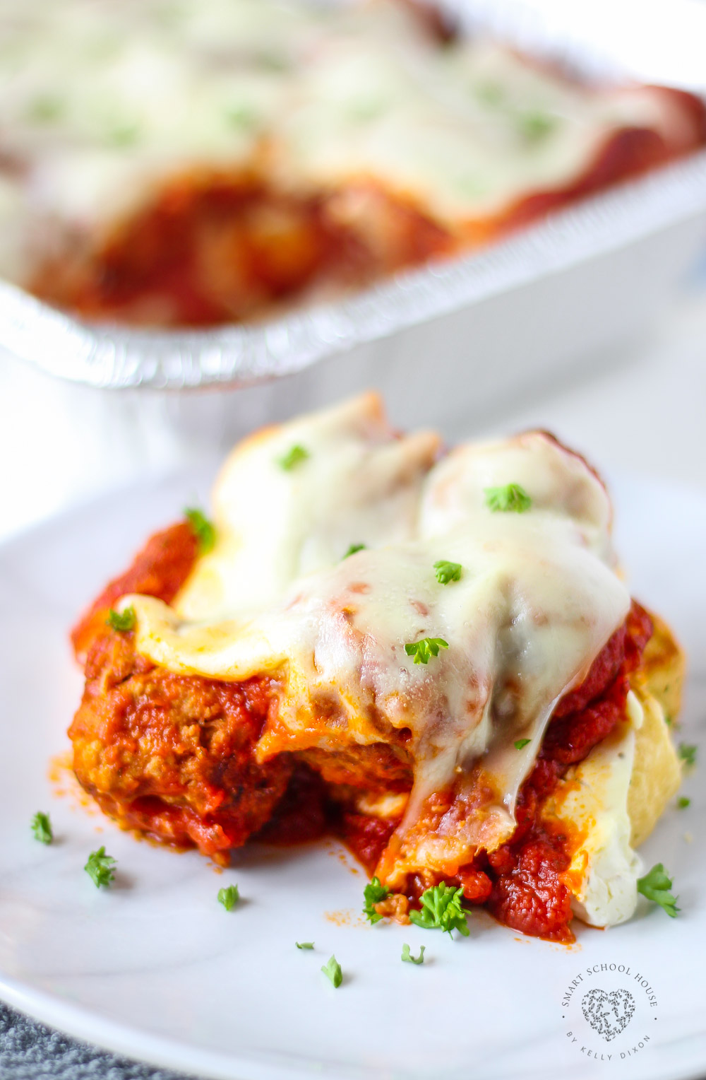 Meatball Sub Casserole - Layers of meatballs, creamy mozzarella cheese, and a special cheese sauce all on top of garlic toast. This casserole a perfect weeknight dinner.