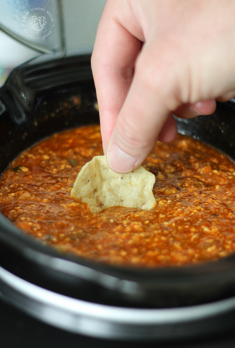 This quick and easy homemade Crock Pot Chili Dip is loaded with queso fresco goodness, chili, and salsa.