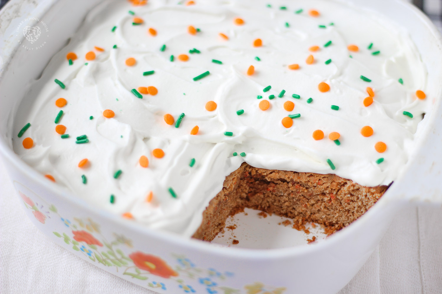 Lazy Carrot Cake - Made with butter, eggs, and topped with a whipped cream frosting. 
