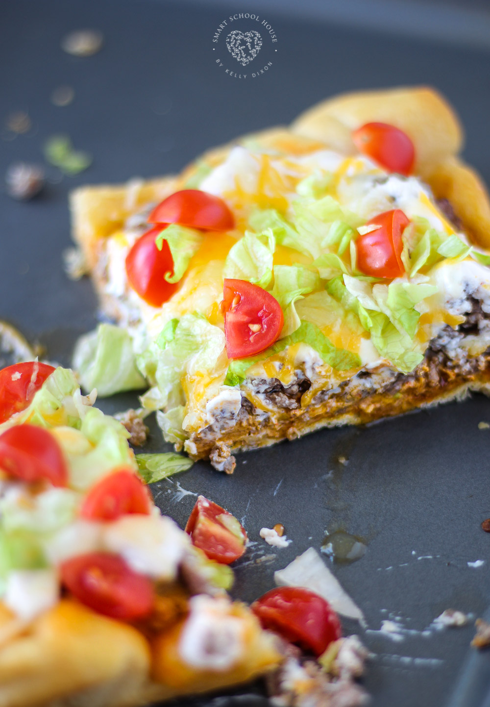 This 30 minute dinner turns fluffy crescent dough turned into pizza crust. The special cheese sauce in this Taco Pizza makes it OVER THE TOP!