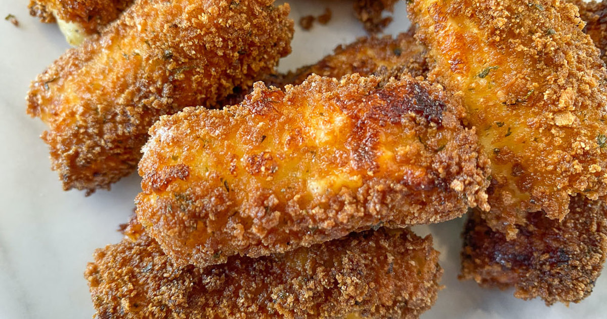 Mozzarella Sticks Coated In A Simple Batter And Fried To Golden