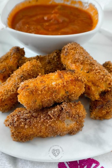 Mozzarella Sticks Coated in a Simple Batter and Fried to Golden Perfection. Ooey gooey and creamy homemade mozzarella sticks surrounded in perfectly fried Italian batter. Knowing how to make your own mozzarella sticks is a dangerous thing:) 
