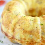 The BEST Breakfast Bundt Cake Recipe! For brunch or just a yummy breakfast for your family, this easy egg dish baked in a beautiful bundt cake pan will leave everyone full and happy! A great breakfast idea for the holidays too.