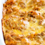 Tortilla Chip Enchiladas are made with beef or chicken, enchilada sauce, spices, cheese, and crispy tortilla chips.