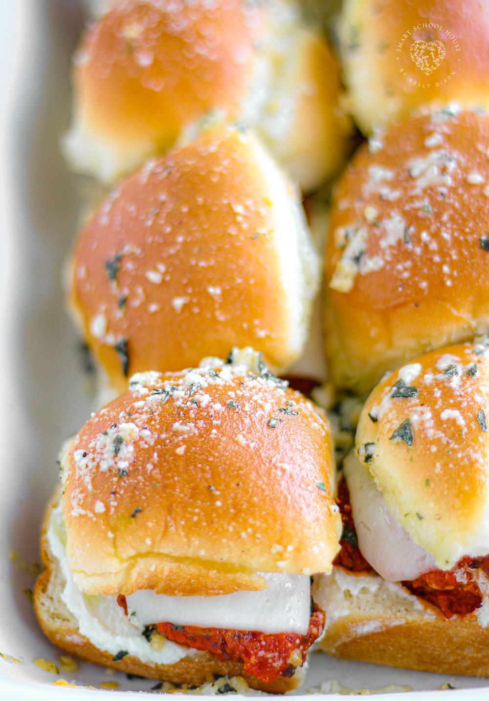 Cheesy Meatball Sliders - These cheesy, garlic butter mini meatball subs are perfect for parties, snacks and weeknight meals + holidays! Easily homemade and delicious recipe!