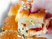 Cheesy Meatball Sub Sliders - These cheesy, garlic butter mini meatball sub sliders are perfect for parties, snacks and weeknight meals + holidays! Easily homemade and delicious recipe!