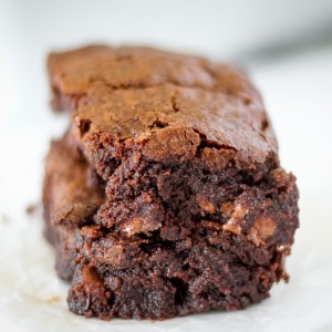 Thick homemade brownies with crispy edges, chewy middles, and rich chocolate flavor.