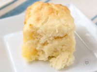 Quick and easy homemade buttermilk biscuits swimming in butter! The ultimate comfort food. These buttermilk biscuits are perfect for breakfast with gravy, jelly or honey, or served as a side dish for dinner. They go great with chili, meat, and soup. One of the best recipes on Pinterest ever, seriously! Your grandmothers would be so proud. They bake up in no time and the entire family will love this simple side dish as it goes with any meal. 