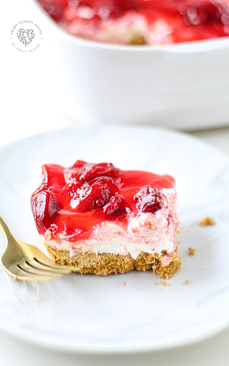 Easy Strawberry Cheesecake Bars, these irresistible squares are quick, easy and so delicious! Made with a graham cracker crust and strawberry filling. Easy and tasty bars. 