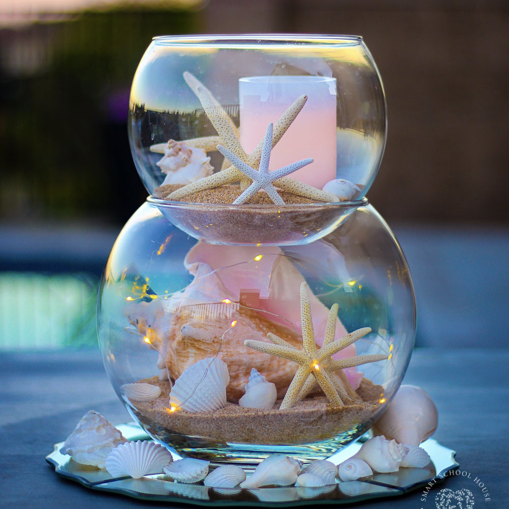 Stacked Fish Bowl with Seashells, Sand, and Starfish. Perfect for a coastal centerpiece, under the sea party, or beach decor!