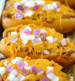 Chili Corn Dogs are a game changer! Baked corn dogs, with the stick removed, opened up and filled with chili and cheese. BRILLIANT!