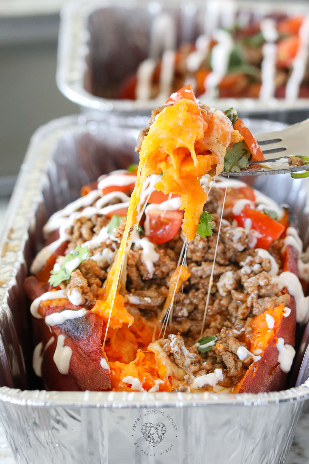 Taco Stuffed Potatoes are nutritious sweet potatoes OR everyone's favorite russet potatoes overflowing with seasoned meat and classic taco toppings!