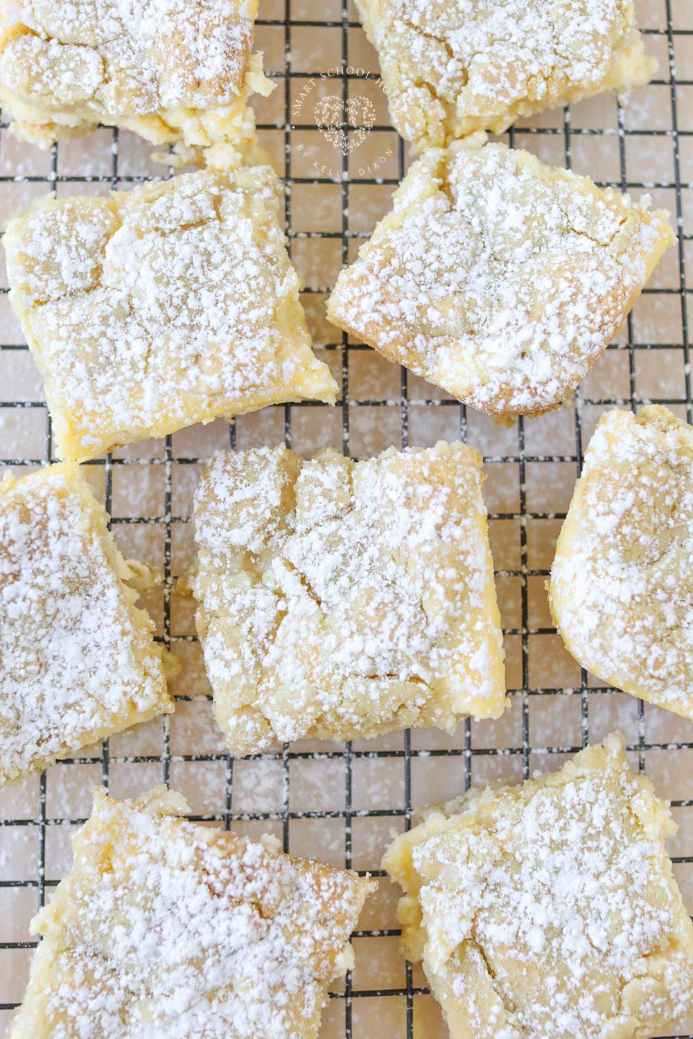Easy Lemon Cheesecake Bars with a sugar cookie crust! The perfect combination of creamy, sweet, and tart. 