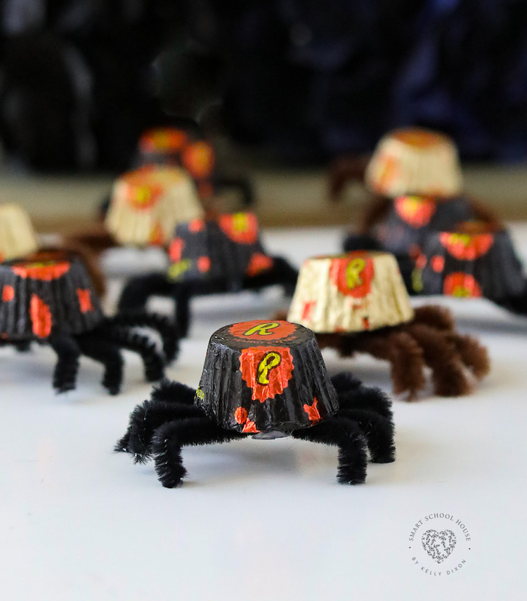 Peanut Butter Cup Spiders are a cute and easy Halloween craft idea that will put a smile on everyone's face! These spooky spiders are easy to make and oh so fun to share with friends this October. 