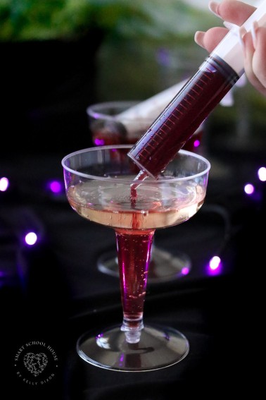 Our Vampire Champagne is a festive drink on Halloween! This champagne and juice syringe drink is as fun to make as it is to drink! It can also be made kid-friendly by swapping the champagne for sparkling cider.