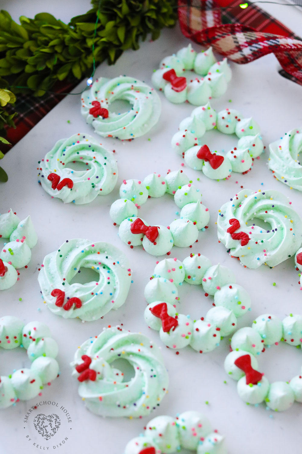 Christmas Meringue Wreath Cookies will put a smile on everyone's face this holiday season! Perfectly sweet and fluffy with an airy crunch.