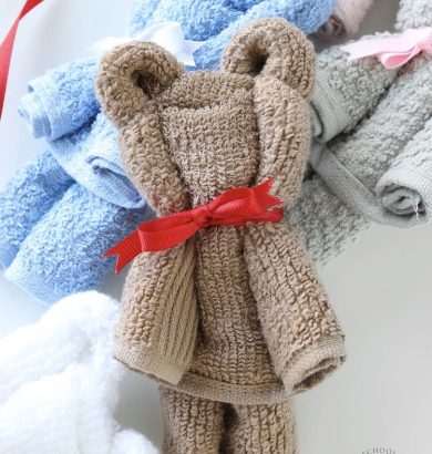 Making a Washcloth Teddy Bear is so easy and fun! This is a no-sew project easy enough for anyone to make.