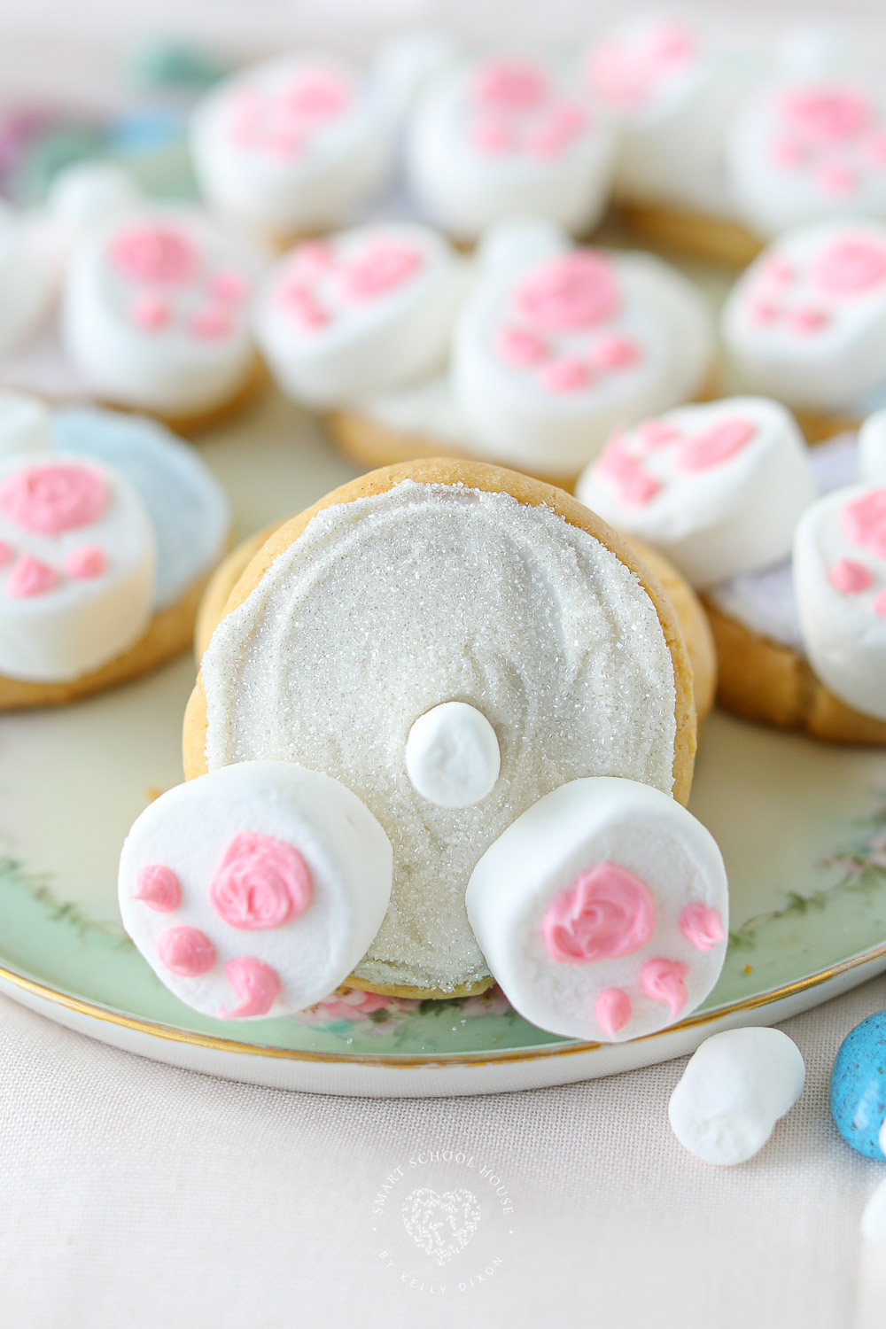 Bunny Butt Cookies are frosted Easter cookies that feature little bunny paws made with marshmallows and a little white marshmallow tail. 