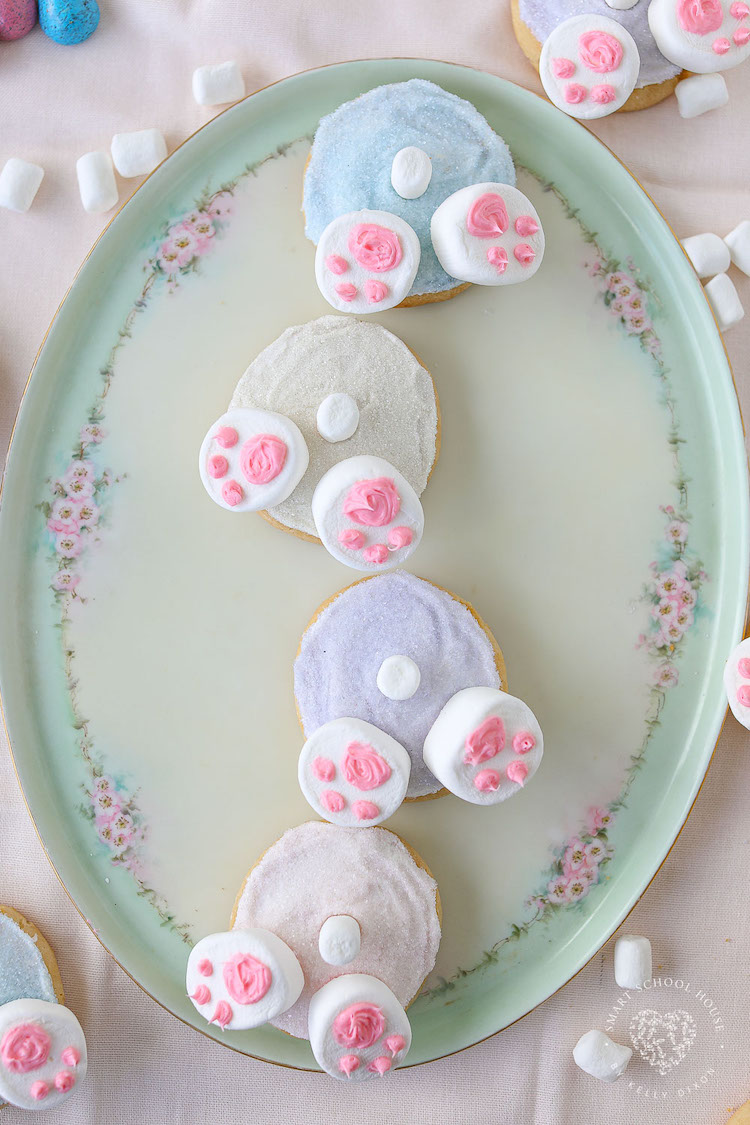 Bunny Butt Cookies are frosted Easter cookies that feature little bunny paws made with marshmallows and a little white marshmallow tail. 