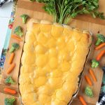 Cheesy Carrot Shaped Pull Apart Bread is made of everyone's favorite buttery biscuits rolled around cheese and shaped into a cute carrot.