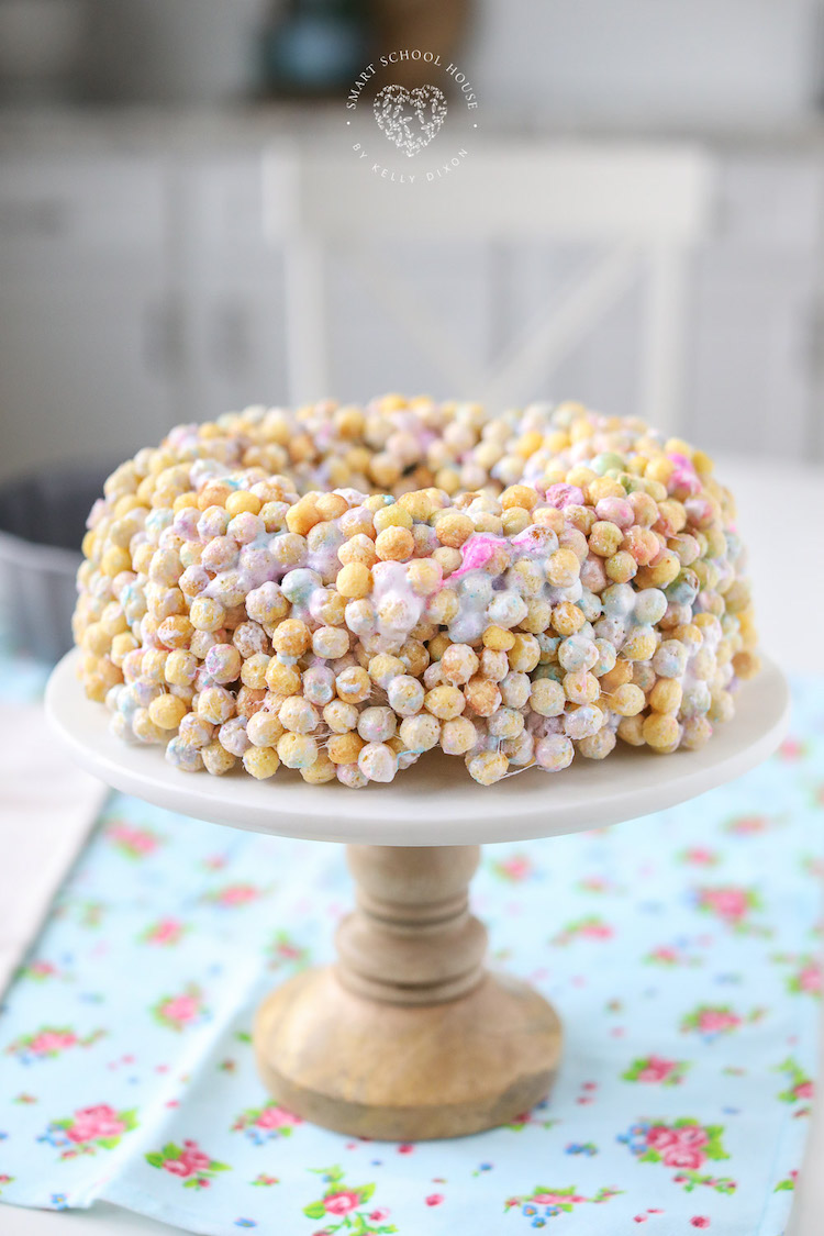 This colorful Peeps Bundt Cake is made of Kix and melted Peeps marshmallows! Made in a bundt cake pan and cut into cereal Peeps treats!
