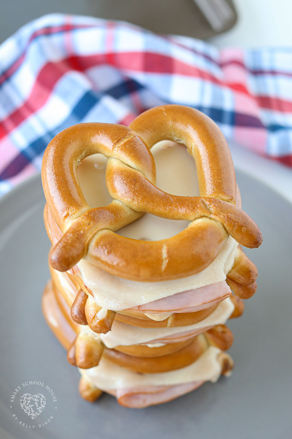 Warm Pretzel Sandwiches are big soft pretzels stuffed with ham and melted Swiss cheese! This easy lunch puts a fun spin on a regular sandwich!