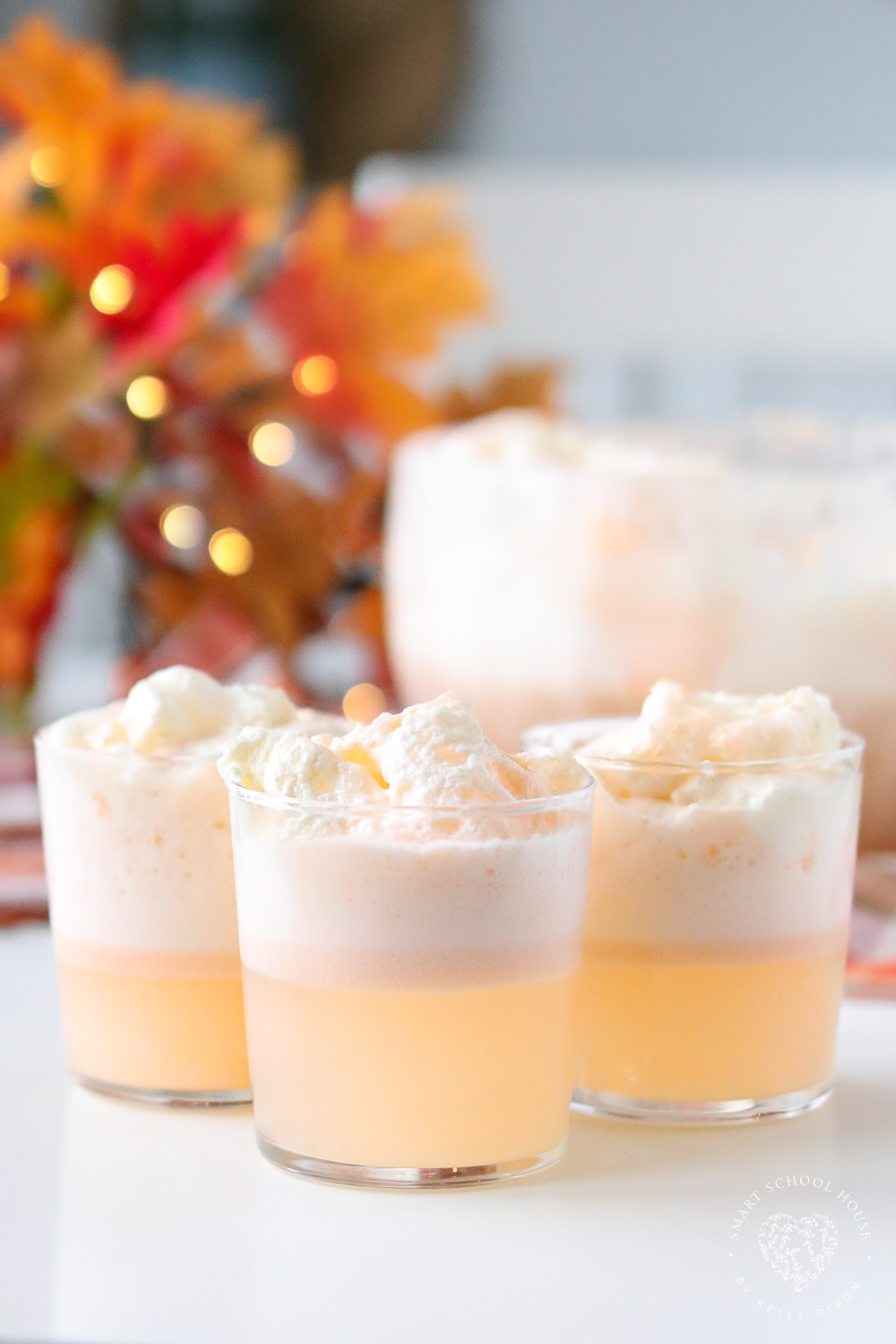 Orange Dreamsicle Punch! Creamy orange flavors made with bubbly sodas topped with ice cream and orange sherbet!