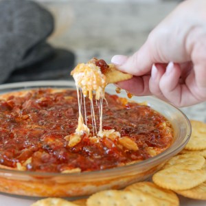 Pepper Jelly Cheese Dip is a warm appetizer served with butter crackers! This easy appetizer recipe uses simple ingredients that have the best flavor when combined.