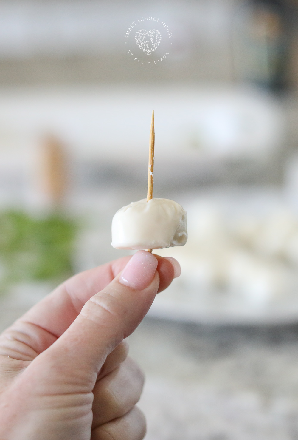 Small mozzarella ball on a toothpick