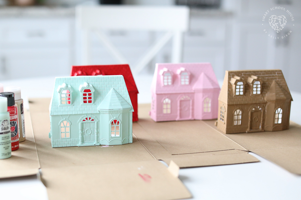 Acrylic paint on small plastic doll houses