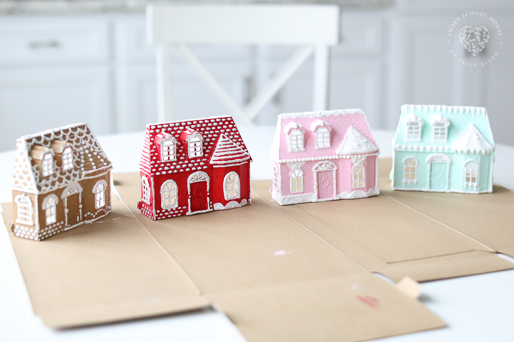 Puffy paint snow on painted doll houses