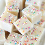 Sugar Cookie Fudge with rainbow sprinkles! This fun and easy 4-ingredient fudge recipe tastes like a sweet sugar cookie!